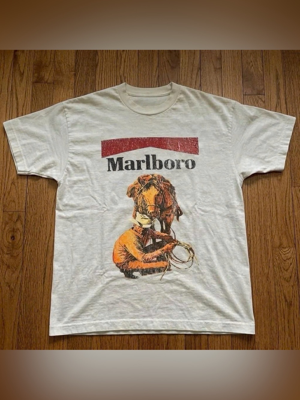 Vintage White Tee with Red Marlboro Logo and Orange Cowboy Graphic